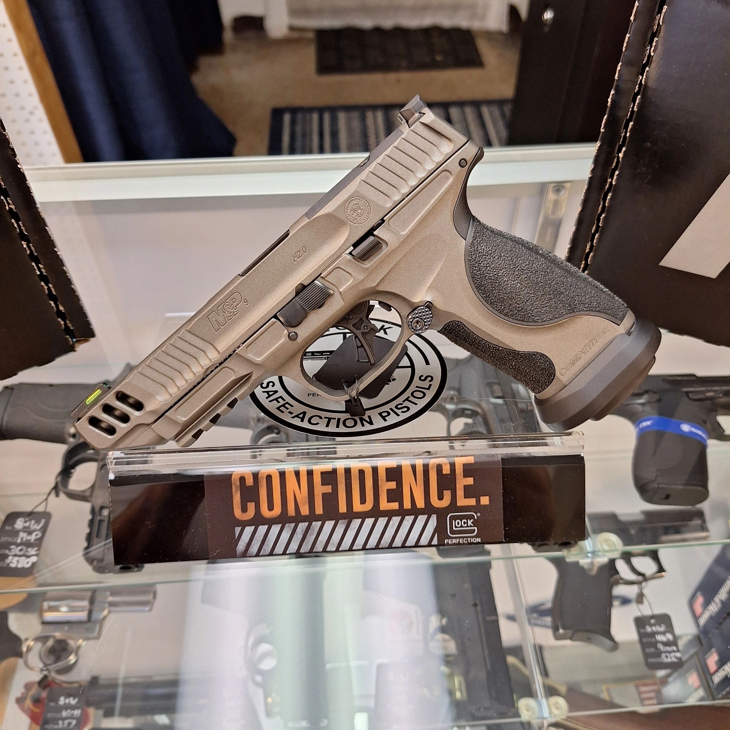 Glock pistol on display stand — Confidence, Satisfaction, Glock Perfection
